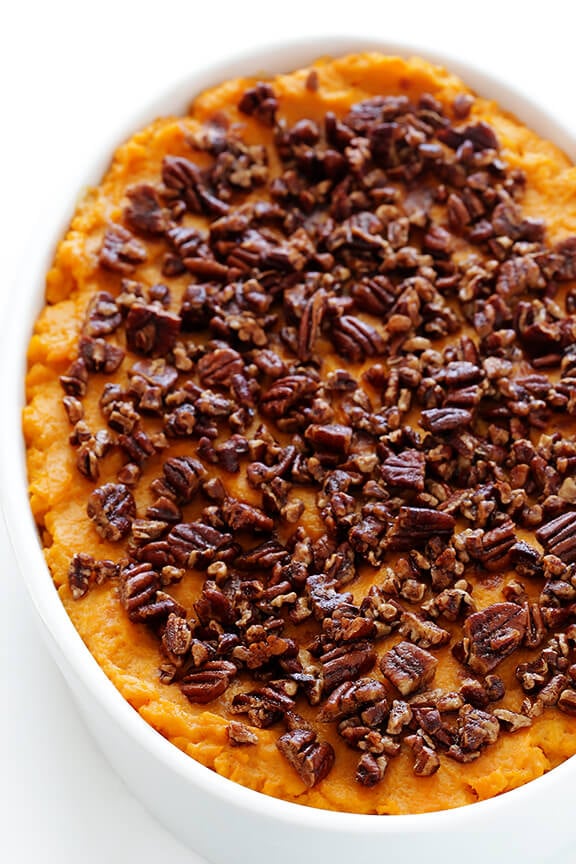 Healthier Sweet Potato Casserole -- naturally sweetened with a hint of maple syrup, and topped with cinnamon pecans | gimmesomeoven.com