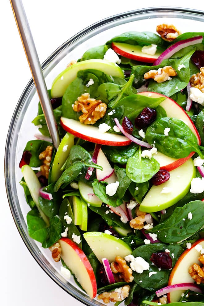 My favorite Apple Spinach Salad is made with tons of baby spinach and crisp apples, toasted nuts, soft cheese, and a zippy vinaigrette. Perfect for autumn, and so easy to make! | gimmesomeoven.com