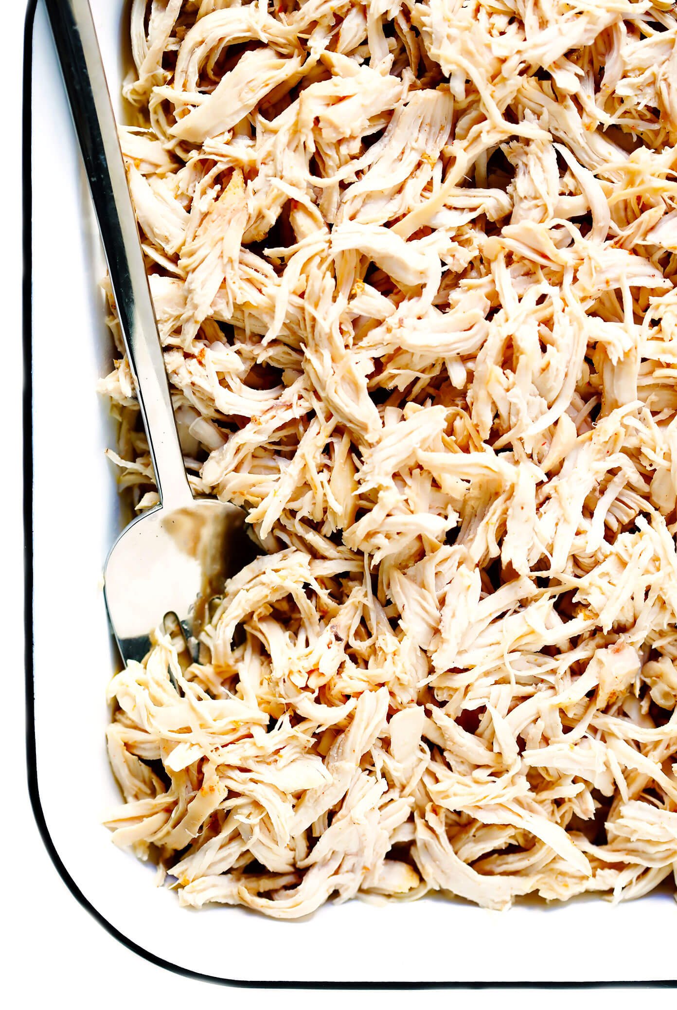 This Instant Pot Shredded Chicken is easy to make in the pressure cooker, tender and easy to shred, and made with an all-purpose seasoning that goes well with any recipe. (Although feel free to use Italian, Mexican, Cajun or other seasonings if you prefer!) | gimmesomeoven.com #chicken #instantpot #pressurecooker #healthy #mealprep #glutenfree Shredded Chicken