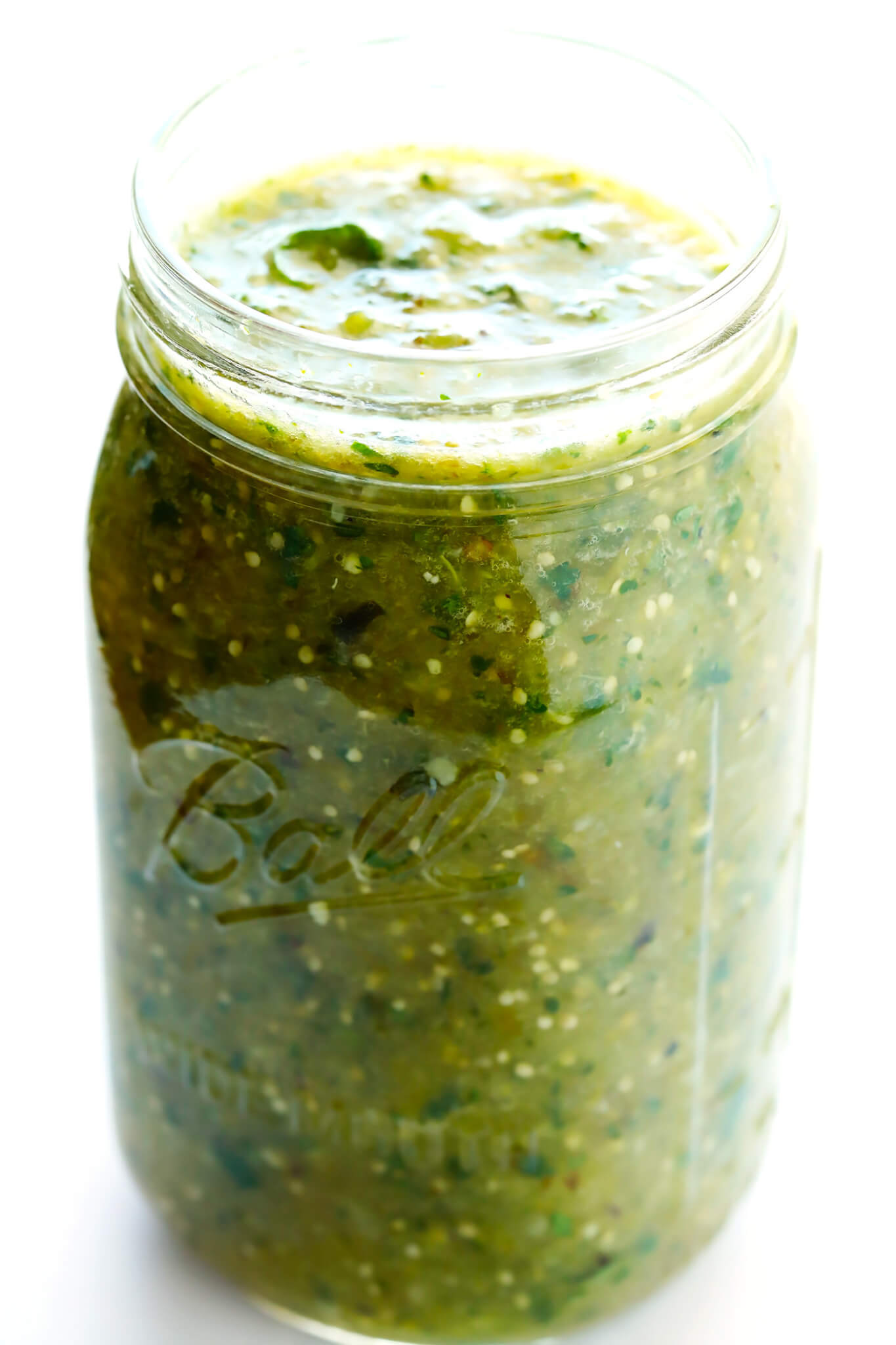 My favorite recipe for homemade Salsa Verde! It's quick and easy to make in the blender or food processor, it's made with fresh tomatillo, onion, cilantro, lime juice, cumin and garlic, and it's the perfect sauce to go with all of your favorite Mexican food! | gimmesomeoven.com (Gluten-Free / Vegetarian / Vegan)