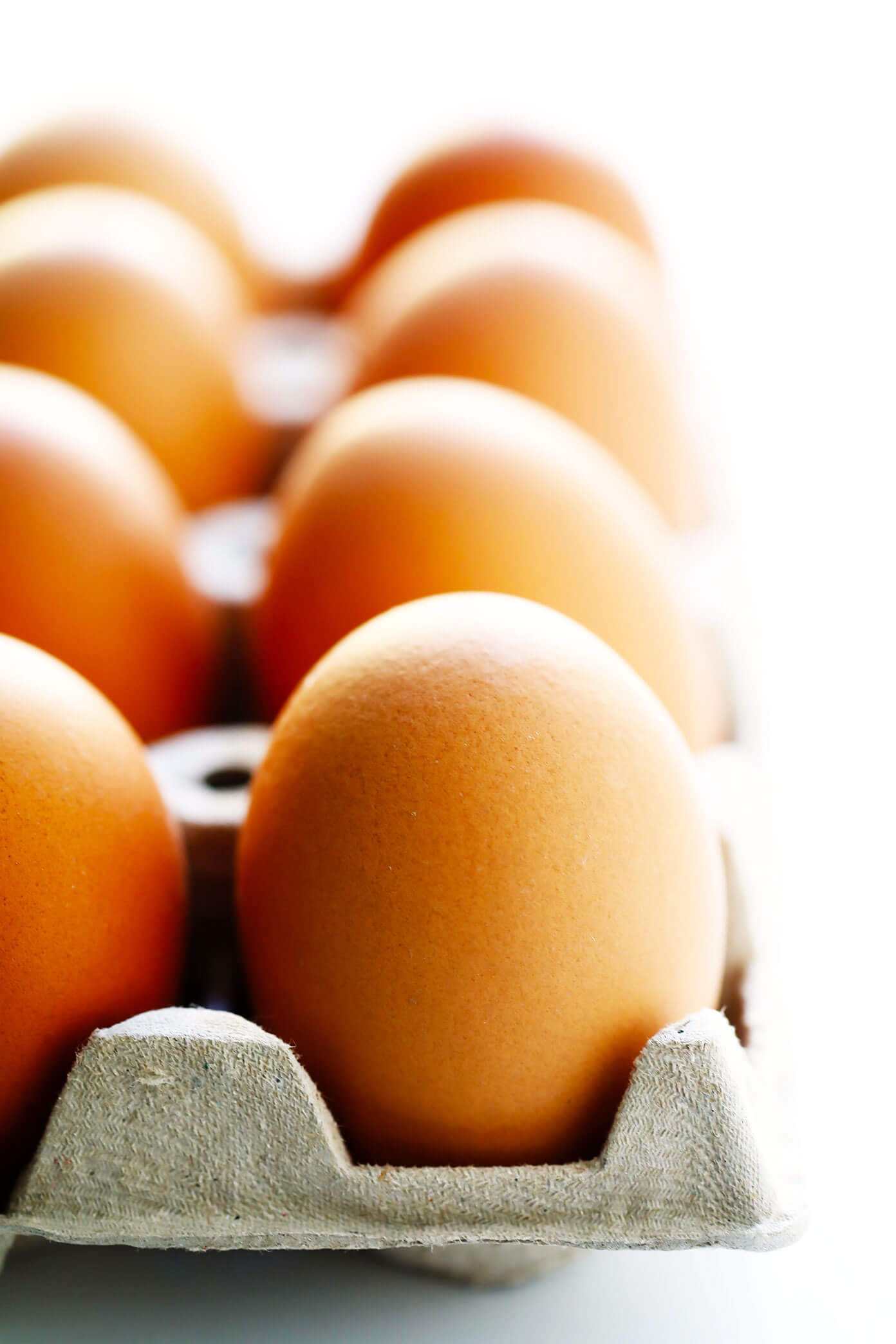 A dozen brown eggs