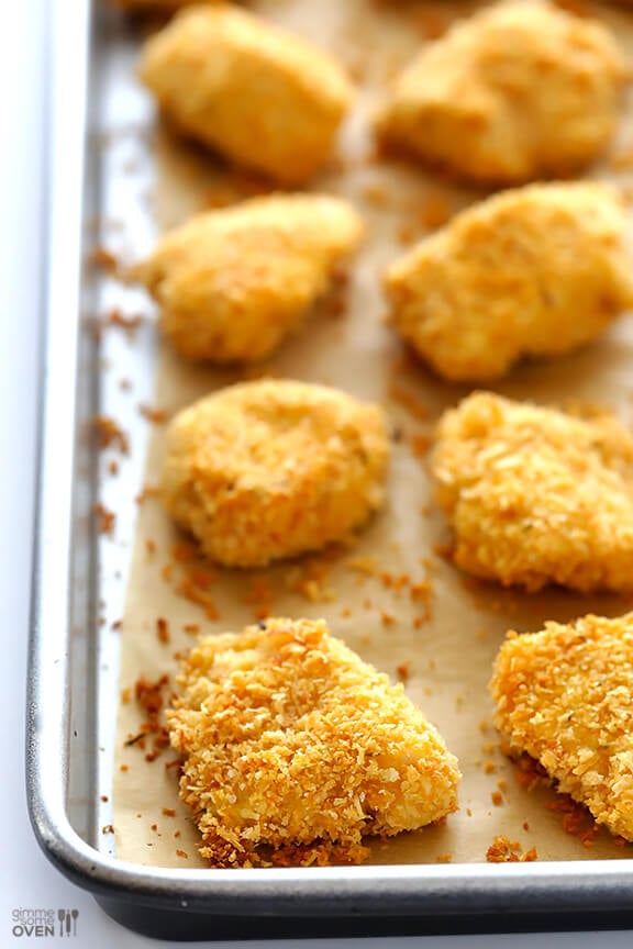 Parmesan Baked Chicken Nuggets -- crispy, easy to make, and SO tasty! | gimmesomeoven.com