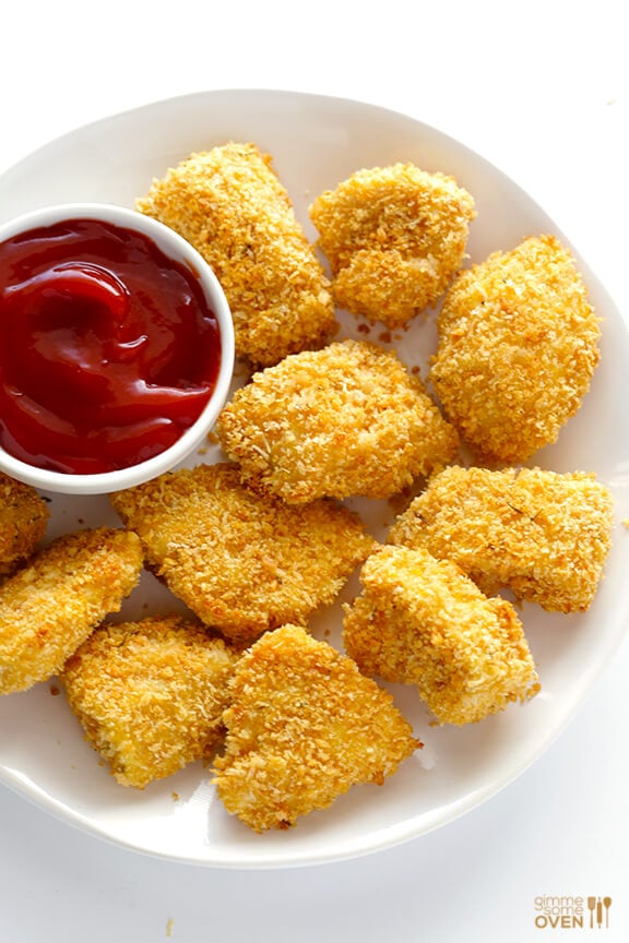 Parmesan Baked Chicken Nuggets -- crispy, easy to make, and SO tasty! | gimmesomeoven.com