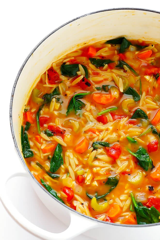 This Italian Orzo Spinach Soup recipe is ready to go in 30 minutes, and it's so delicious and comforting! Feel free to add in some Italian sausage if you'd like extra protein. | gimmesomeoven.com