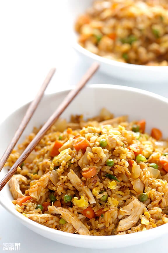 Spicy Chicken Fried Rice -- kicked up a notch with some sriracha, and ready to go in about 20 minutes! | gimmesomeoven.com