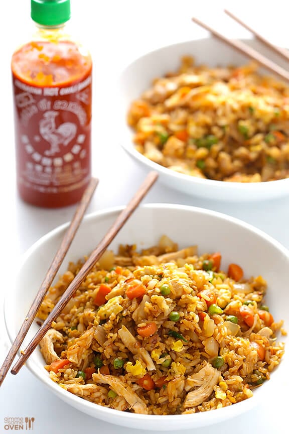 Spicy Chicken Fried Rice -- kicked up a notch with some sriracha, and ready to go in about 20 minutes! | gimmesomeoven.com