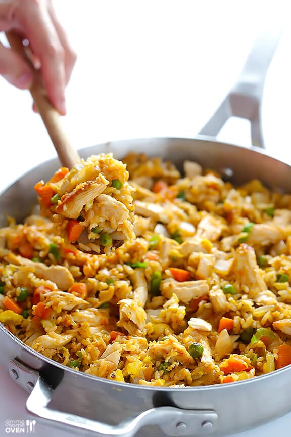 Spicy Chicken Fried Rice -- kicked up a notch with some sriracha, and ready to go in about 20 minutes! | gimmesomeoven.com