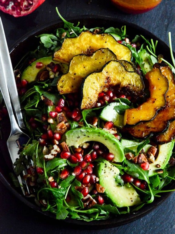 Autumn Arugula Salad with Caramelized Squash and Pomegranate Ginger Vinaigrette | How Sweet Eats