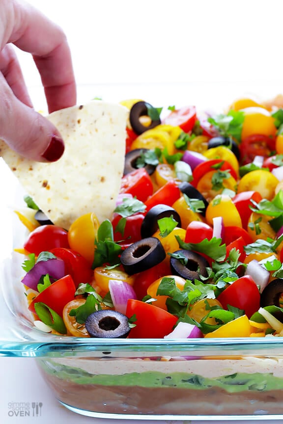 7 Layer Dip -- a fresh recipe for this classic dip that's always a crowd-pleaser! | gimmesomeoven.com #appetizer #gameday