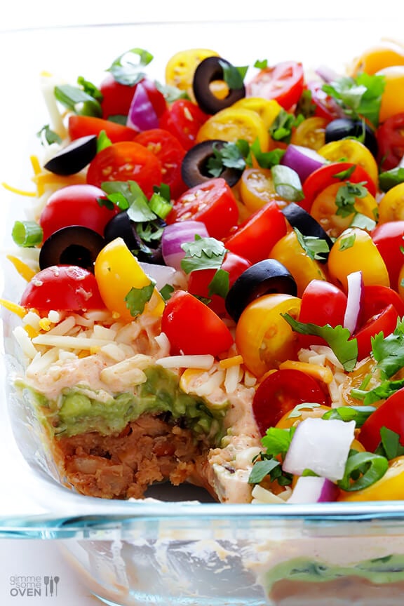 7 Layer Dip -- a fresh recipe for this classic dip that's always a crowd-pleaser! | gimmesomeoven.com #appetizer #gameday