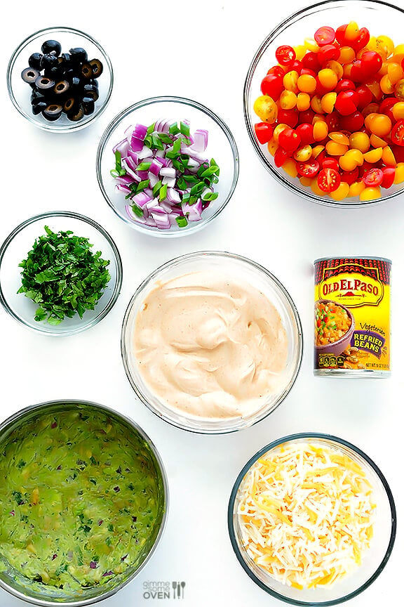 7 Layer Dip -- a fresh recipe for this classic dip that's always a crowd-pleaser! | gimmesomeoven.com #appetizer #gameday