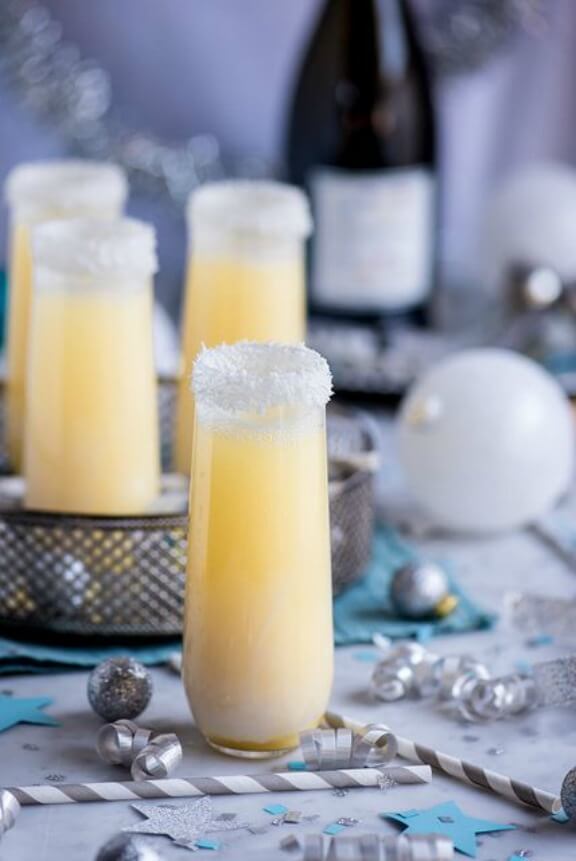 Pineapple Coconut Champagne Cocktail | pineappleandcoconut.com