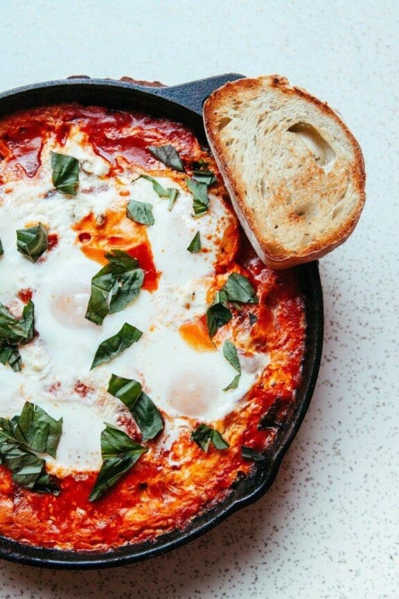 Cast Iron Baked Eggs in Tomato Sauce | thebakingbird.com