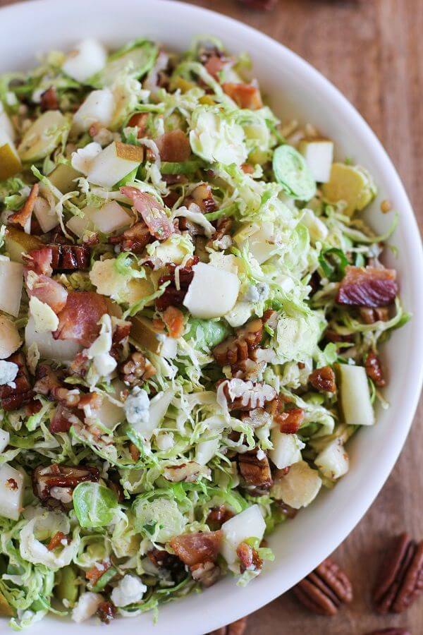 Brussel Sprout Chopped Salad with Warm Bacon Vinaigrette | theroastedroot.net