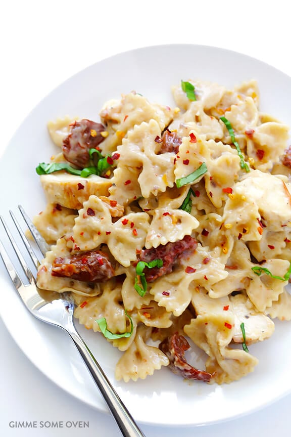 Creamy Pasta with Chicken & Sun-Dried Tomatoes -- ready to go in 30, and made with a lightened-up sauce | gimmesomeoven.com