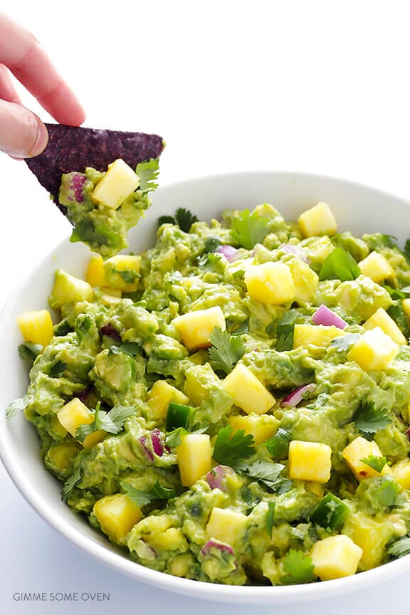 Pineapple Guacamole Recipe -- all of the goodness of this classic dip, sweetened up with some fresh pineapple! | gimmesomeoven.com