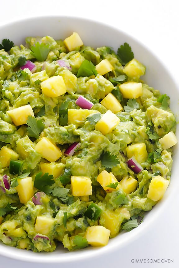 Pineapple Guacamole Recipe -- all of the goodness of this classic dip, sweetened up with some fresh pineapple! | gimmesomeoven.com