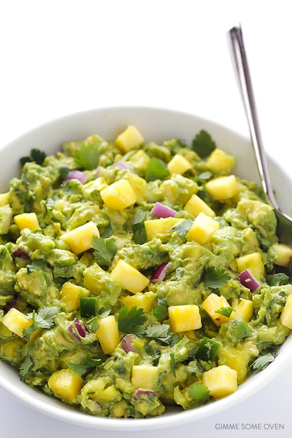 Pineapple Guacamole Recipe -- all of the goodness of this classic dip, sweetened up with some fresh pineapple! | gimmesomeoven.com