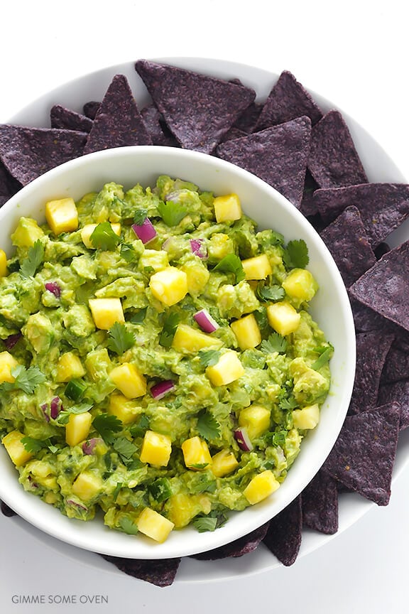 Pineapple Guacamole Recipe -- all of the goodness of this classic dip, sweetened up with some fresh pineapple! | gimmesomeoven.com