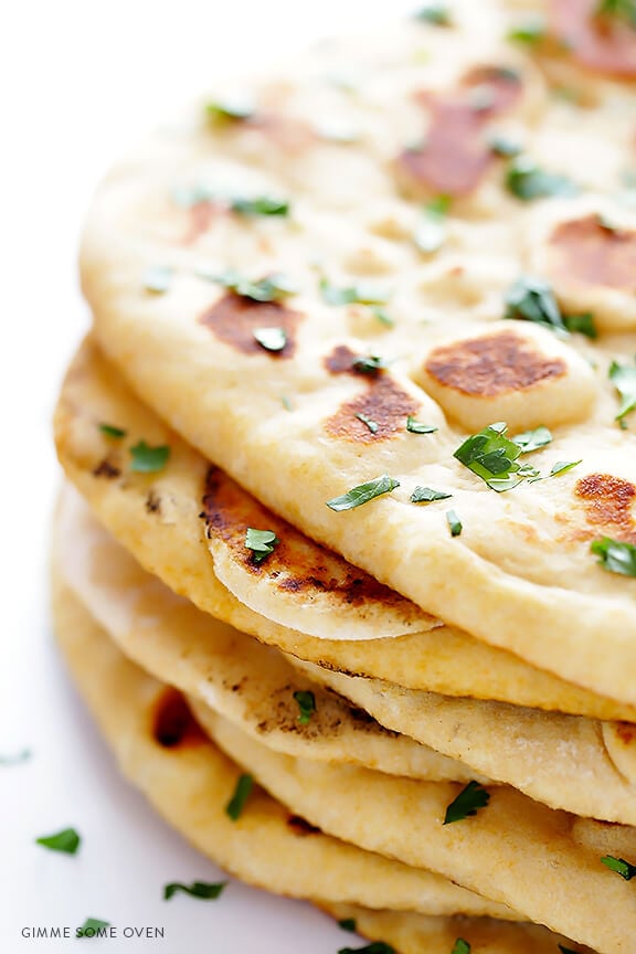 Learn how to make homemade naan (Indian flatbread) with this simple and delicious recipe! | gimmesomeoven.com