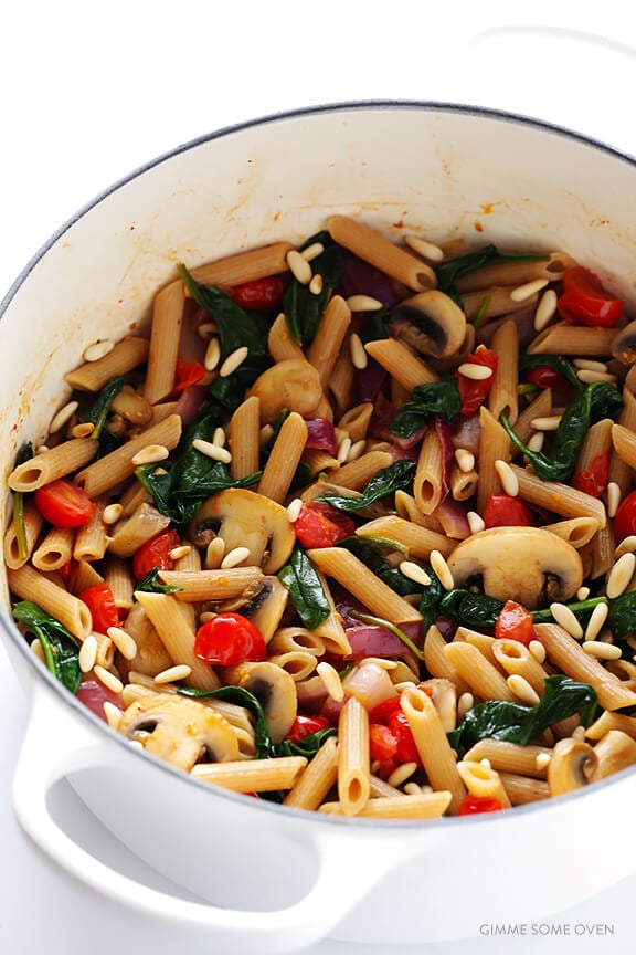 Pasta with Mushrooms Tomatoes and Spinach -- easy to make, and tossed with a delicious white wine garlic sauce | gimmesomeoven.com