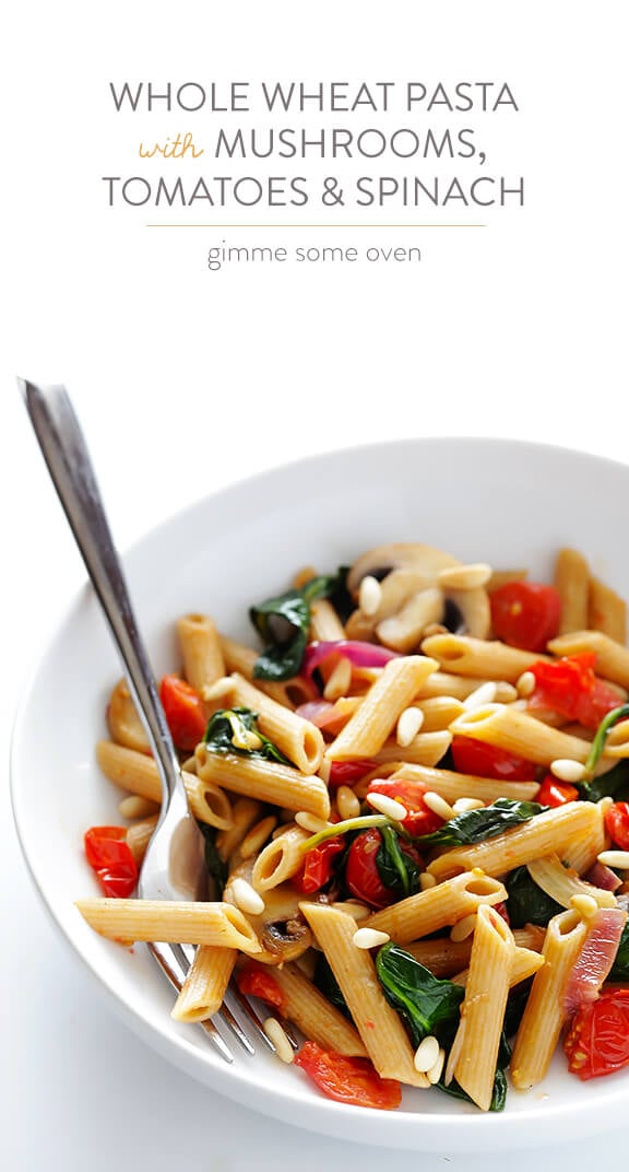 Pasta with Mushrooms Tomatoes and Spinach -- easy to make, and tossed with a delicious white wine garlic sauce | gimmesomeoven.com
