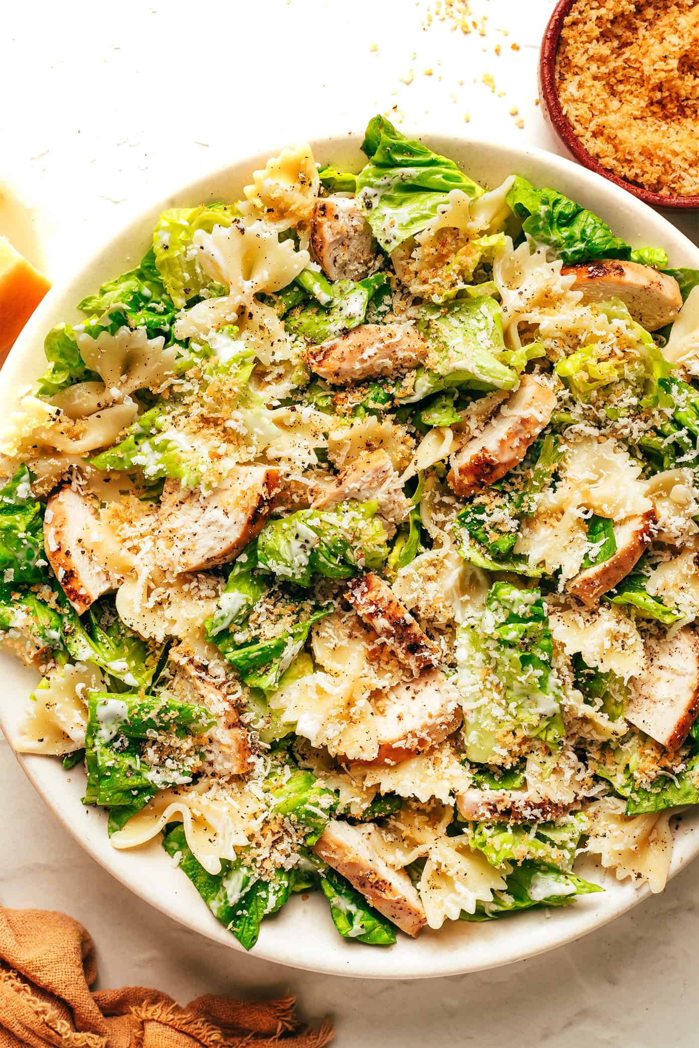 Chicken Caesar Pasta Salad with garlick breadcrumbs in bowl