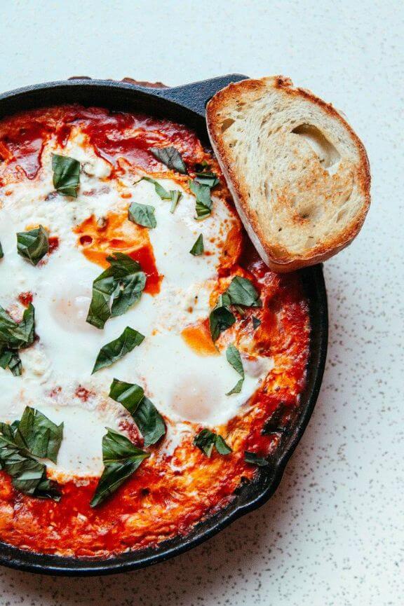 Cast Iron Baked Eggs in Tomato Sauce (Shakshuka) | thebakingbird.com