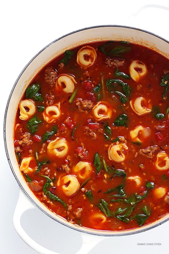 Tortellini Soup with Italian Sausage, Spinach and Tomatoes -- quick and easy to make, and full of the most comforting flavors! | gimmesomeoven.com