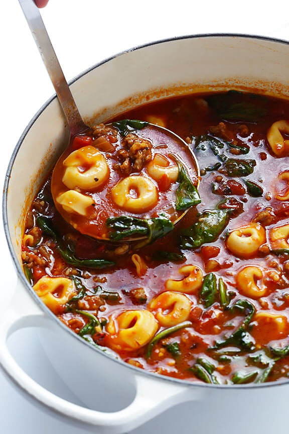 Tortellini Soup with Italian Sausage, Spinach and Tomatoes -- quick and easy to make, and full of the most comforting flavors! | gimmesomeoven.com