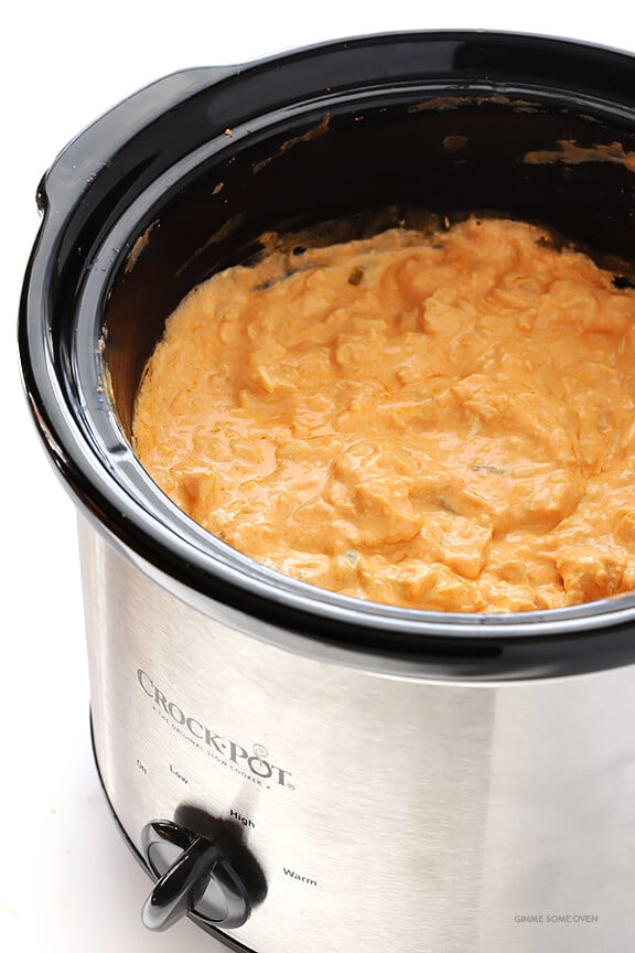 Slow Cooker Buffalo Chicken Dip -- the irresistible appetizer we all love, made extra easy in the crock pot! | gimmesomeoven.com