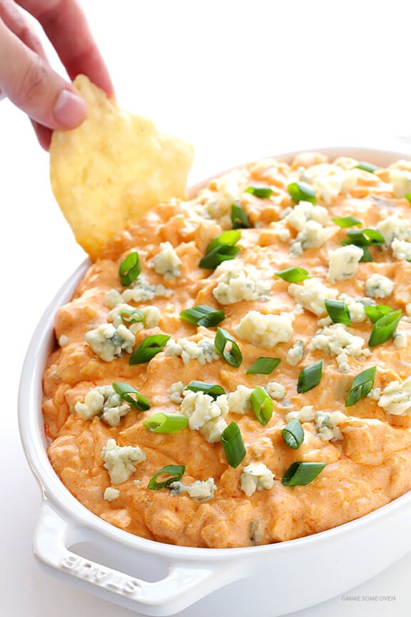Slow Cooker Buffalo Chicken Dip -- the irresistible appetizer we all love, made extra easy in the crock pot! | gimmesomeoven.com