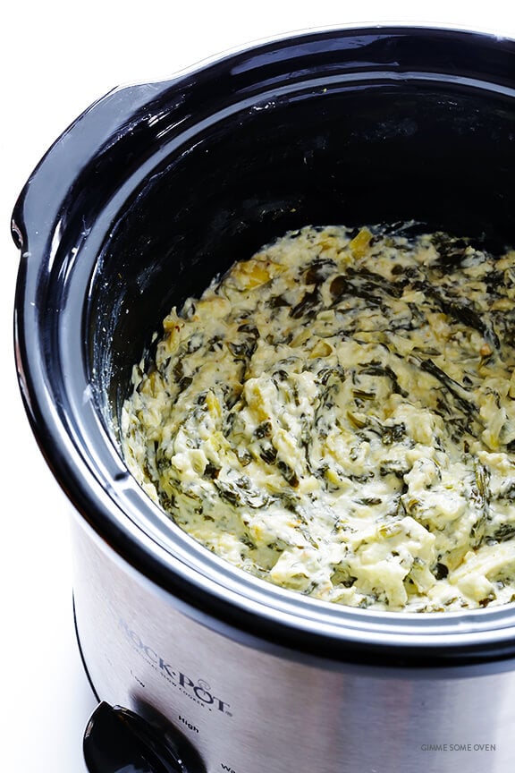 Slow Cooker Spinach Artichoke Dip -- the delicious dip we all love, made extra quick and easy in the crock pot | gimmesomeoven.com