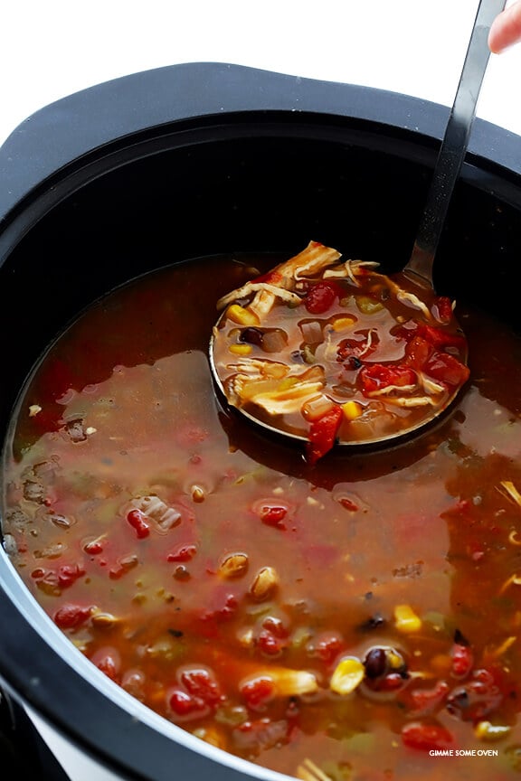 Slow Cooker Chicken Tortilla Soup -- this delicious recipe takes 10 minutes to prep, and then your crock pot does the rest! (It is also naturally gluten-free.) | gimmesomeoven.com