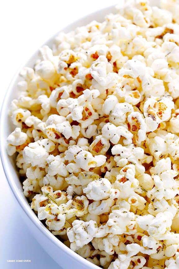 Olive Oil and Parmesan Popcorn -- easy to make with just a few ingredients, and so irresistibly good! | gimmesomeoven.com