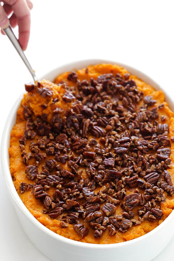 Healthier Sweet Potato Casserole -- naturally sweetened with a hint of maple syrup, and topped with cinnamon pecans | gimmesomeoven.com