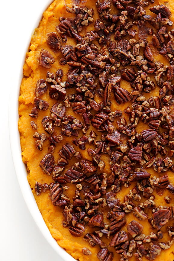 Healthier Sweet Potato Casserole -- naturally sweetened with a hint of maple syrup, and topped with cinnamon pecans | gimmesomeoven.com