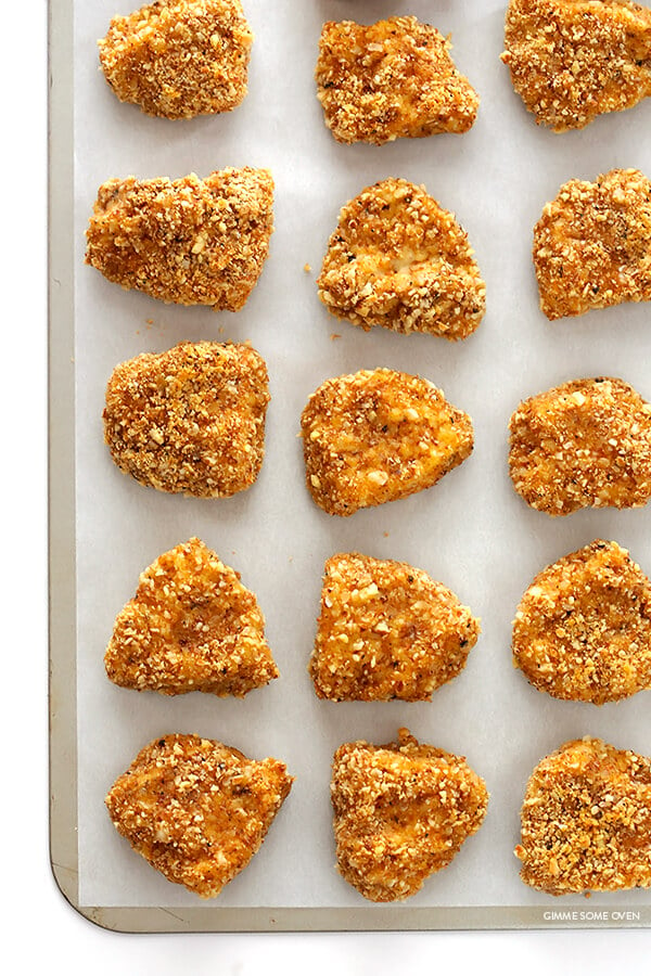 Almond-Crusted Chicken Nuggets -- easy to make, baked instead of fried, and irresistibly delicious! | gimmesomeoven.com