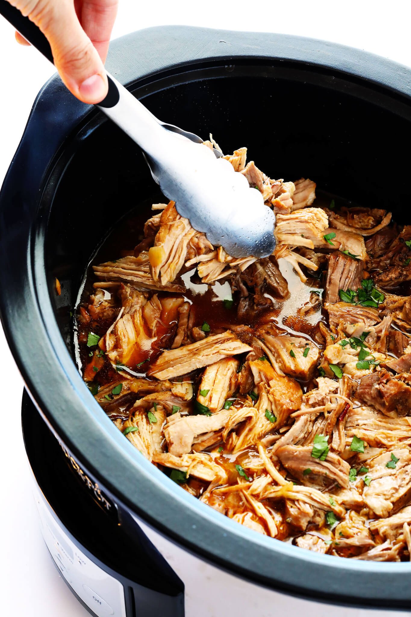 The BEST Slow Cooker Pork Carnitas! They're easy to make in the crock pot, made with my favorite Mexican seasonings, and so crispy and delicious! Perfect for tacos, enchiladas, salads, burritos, quesadillas and more. | gimmesomeoven.com