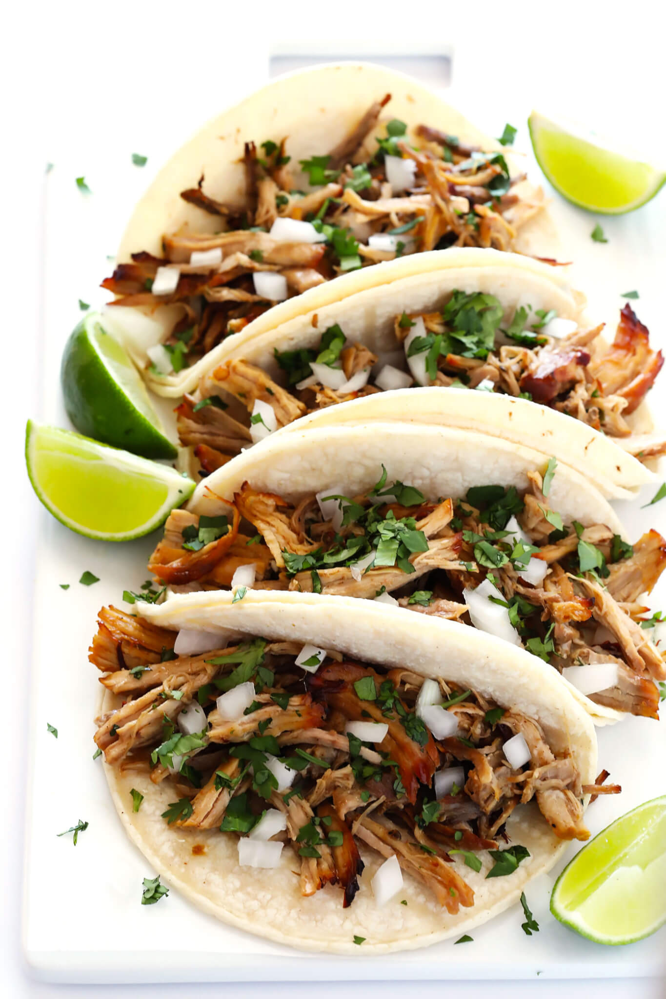 The BEST Slow Cooker Pork Carnitas! They're easy to make in the crock pot, made with my favorite Mexican seasonings, and so crispy and delicious! Perfect for tacos, enchiladas, salads, burritos, quesadillas and more. | gimmesomeoven.com