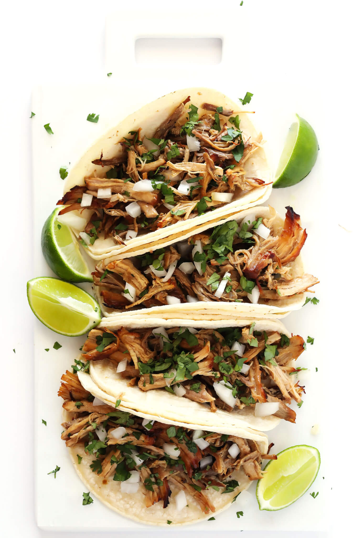 The BEST Slow Cooker Pork Carnitas! They're easy to make in the crock pot, made with my favorite Mexican seasonings, and so crispy and delicious! Perfect for tacos, enchiladas, salads, burritos, quesadillas and more. | gimmesomeoven.com