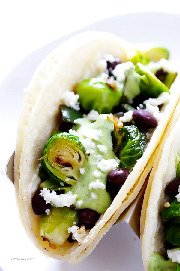 Brussels Sprouts Tacos -- quick and easy to make, and made with a heavenly creamy avocado sauce! | gimmesomeoven.com