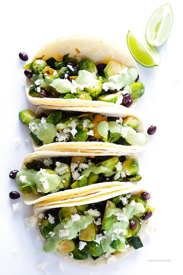 Brussels Sprouts Tacos -- quick and easy to make, and made with a heavenly creamy avocado sauce! | gimmesomeoven.com