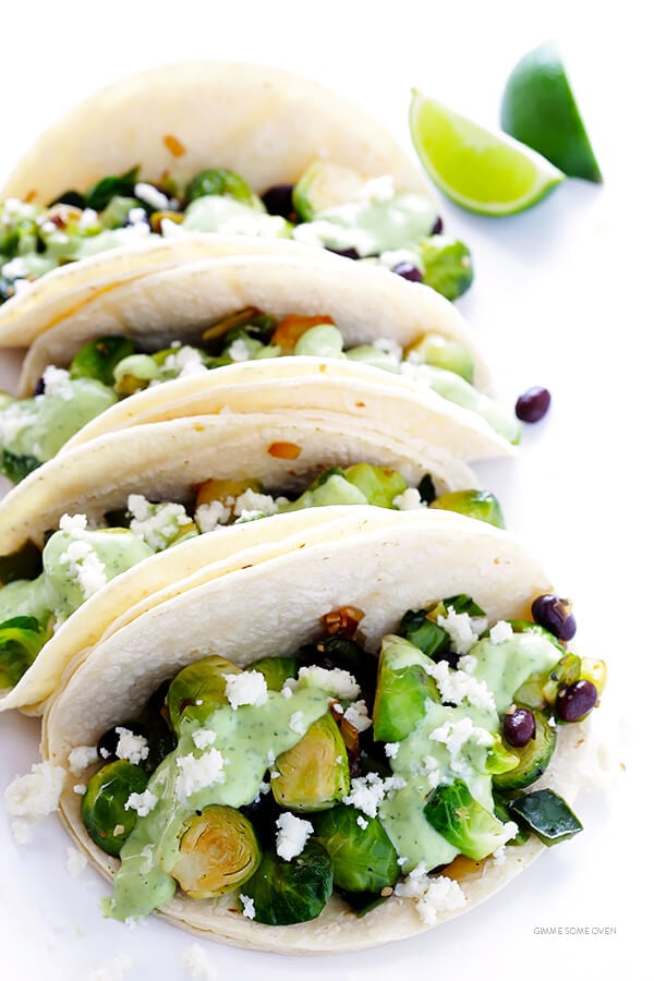 Brussels Sprouts Tacos -- quick and easy to make, and made with a heavenly creamy avocado sauce! | gimmesomeoven.com