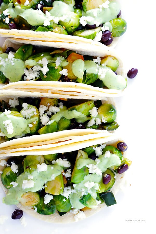 Brussels Sprouts Tacos -- quick and easy to make, and made with a heavenly creamy avocado sauce! | gimmesomeoven.com