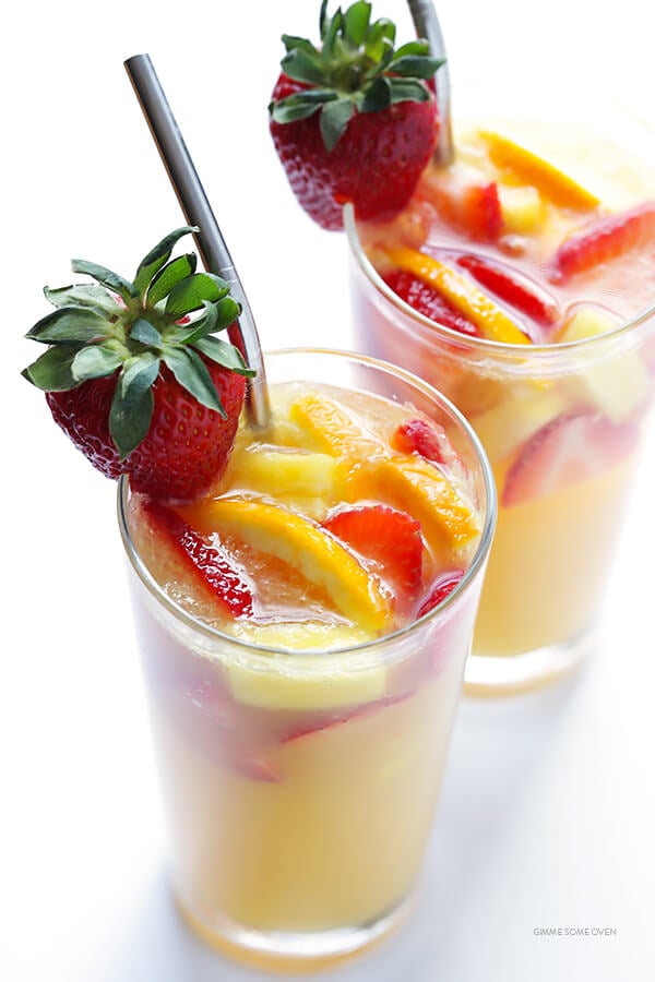 Mimosa Sangria -- quick and easy to make, and kicked up a notch with lots of delicious fresh fruit! | gimmesomeoven.com