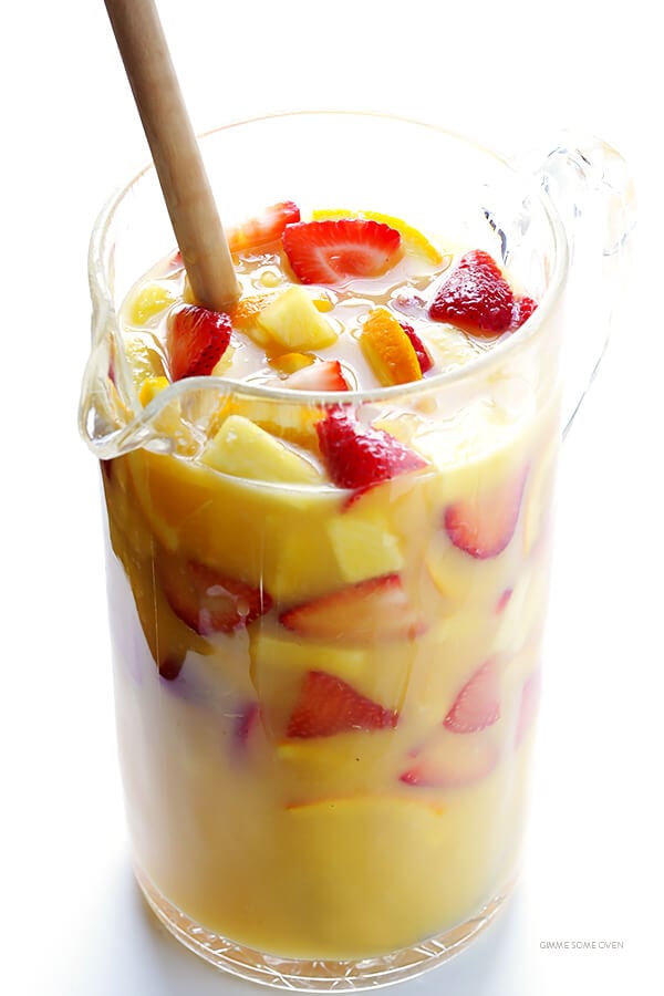 Mimosa Sangria -- quick and easy to make, and kicked up a notch with lots of delicious fresh fruit! | gimmesomeoven.com