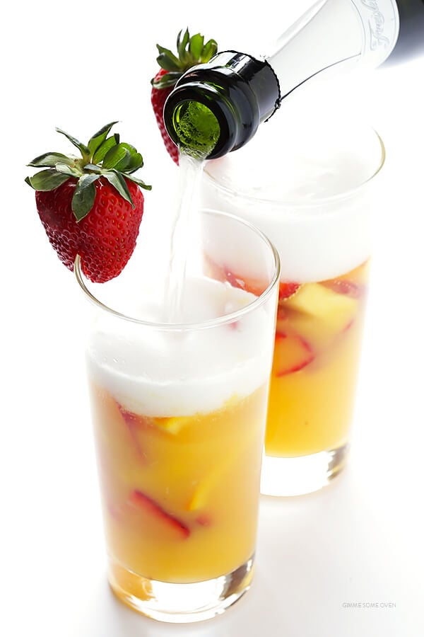 Mimosa Sangria -- quick and easy to make, and kicked up a notch with lots of delicious fresh fruit! | gimmesomeoven.com
