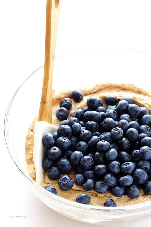 Healthier Blueberry Muffins -- made with white whole wheat flour, naturally sweetened, and SO fluffy and buttery and delicious! | gimmesomeoven.com