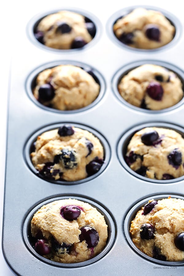 Healthier Blueberry Muffins -- made with white whole wheat flour, naturally sweetened, and SO fluffy and buttery and delicious! | gimmesomeoven.com
